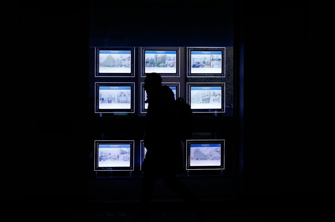 Editor reviewing footage on multiple monitors